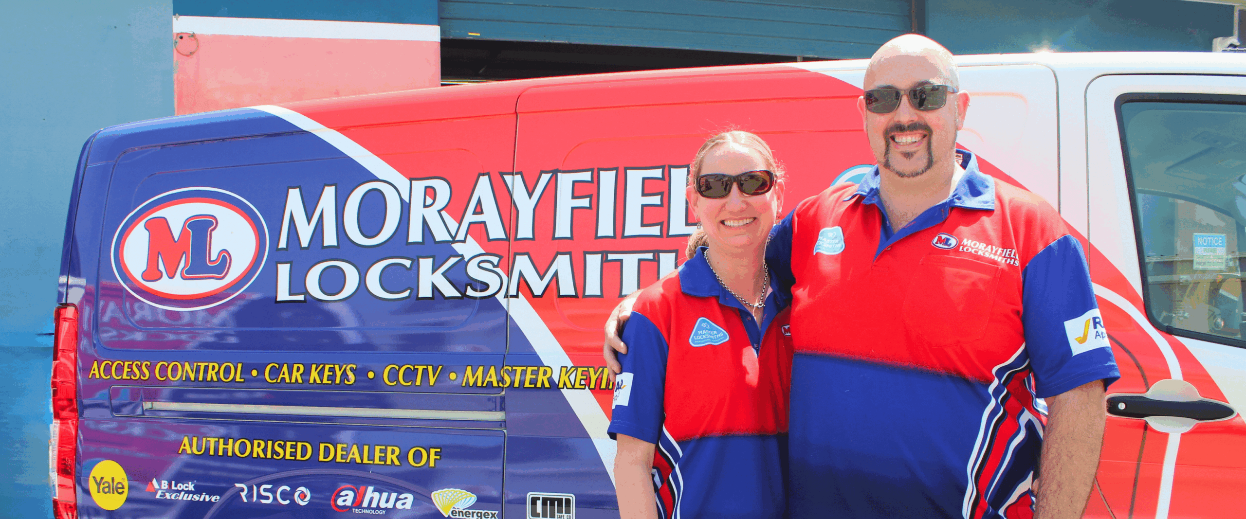 Morayfield Locksmiths service van parked outside the locksmith workshop with owners of the business at 2/56 Beerburrum Rd Caboolture, ready to assist customers across Moreton Bay.