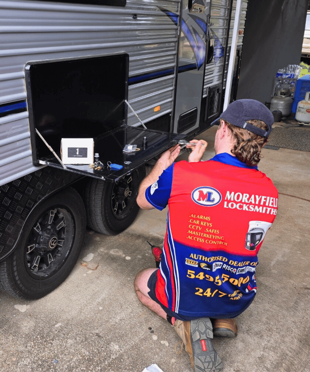 Morayfield Locksmiths technician rekeying a caravan lock on-site as part of a mobile locksmith service in Moreton Bay